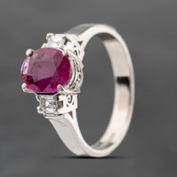 Pre-Owned Platinum 0.95ct Ruby and 0.18ct Diamond Three Stone Ring 43351040