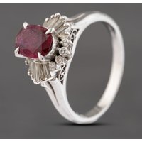 Pre-Owned Platinum 0.98ct Ruby and 0.30ct Diamond Oval Cluster Ring 43351048