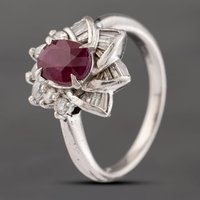 Pre-Owned Platinum 1.74ct Ruby and 0.53ct Diamond Oval Cluster Ring 43351051