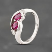 Pre-Owned Platinum 1.01ct Ruby and 0.13ct Diamond Cross Over Dress Ring 43351063