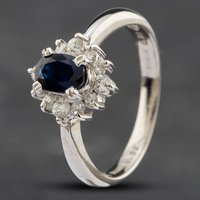 Pre-Owned Platinum 0.27ct Oval Cut Sapphire and 0.27ct Diamond Cluster Ring 43361029