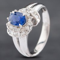 Pre-Owned Platinum 1.31ct Sapphire and 0.52ct Diamond Oval Cluster Ring 43361119