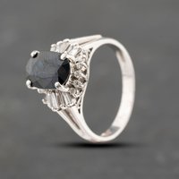 Pre-Owned Platinum Sapphire and 0.36ct Diamond Oval Cluster Ring 43361140