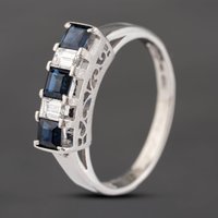 Pre-Owned Platinum 0.61ct Sapphire and 0.21ct Emerald Cut Diamond Five Stone Ring 43361148