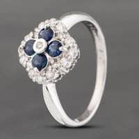 Pre-Owned Platinum Sapphire and 0.26ct Brilliant Cut Diamond Cluster Ring 43361149