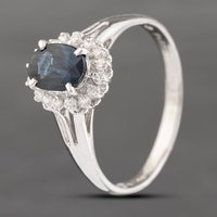 Pre-Owned Platinum 1.16ct Sapphire and 0.18ct Brilliant Cut Diamond Oval Cluster Ring 43361150