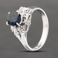 Pre-Owned Platinum 1.24ct Sapphire and 0.22ct Diamond Oval Cluster Ring 43361154