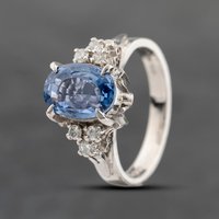 Pre-Owned Platinum 2.30ct Sapphire and 0.12ct Brilliant Cut Diamond Oval Cluster Ring 43361161