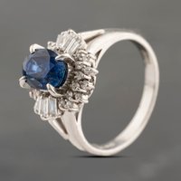 Pre-Owned Platinum 1.90ct Sapphire and 0.35ct Diamond Oval Cluster Ring 43361175
