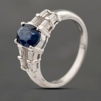 Pre-Owned 18ct White Gold Sapphire and 0.17ct Baguette Cut Diamond Oval Dress Ring 43361191