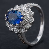 Pre-Owned 14ct White Gold Oval 2.36ct Sapphire and 0.70ct Diamond Cluster Ring 4336144