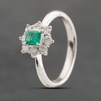 Pre-Owned Platinum Emerald and 0.33ct Brilliant Cut Diamond Oval Cluster Ring 43371062