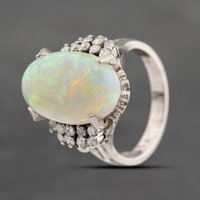 Pre-Owned Platinum 5.12ct Opal and 0.29ct Diamond Oval Dress Ring 43381016
