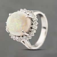 Pre-Owned Platinum 3.18ct Opal and 0.55ct Diamond Oval Cluster Ring 43381025