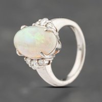 Pre-Owned Platinum 5.13ct Opal and 0.29ct Diamond Oval Dress Ring 43381029