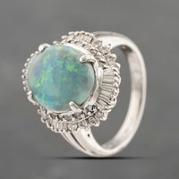 Pre-Owned Platinum 3.44ct Opal and 0.72ct Diamond Oval Cluster Ring 43381031