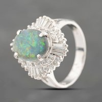 Pre-Owned Platinum 1.37ct Opal and 0.83ct Diamond Oval Cluster Ring 43381033