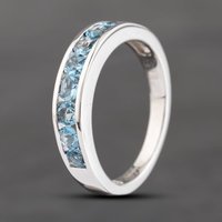 Pre-Owned 18ct White Gold 0.65ct Aquamarine Channel Set Half Eternity Ring 43401018