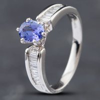 Pre-Owned 14ct White Gold 0.66ct Oval Cut Tanzanite and Baguette Cut Diamond Dress Ring 43411011