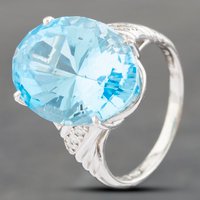 Pre-Owned Platinum 15.1ct Blue Topaz and 0.08ct Brilliant Cut Diamond Oval Dress Ring 43451014