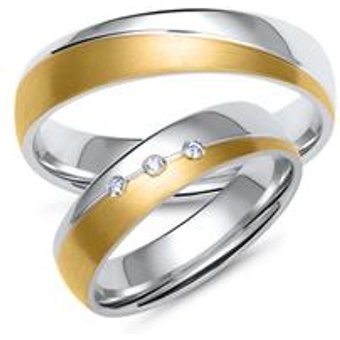 Trauringe aus Gelb- und Weißgold mit 3 Diamanten