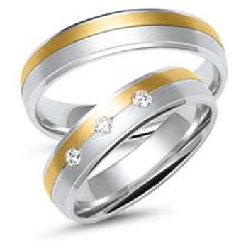 Trauringe aus Weiß- und Gelbgold mit 3 Brillanten