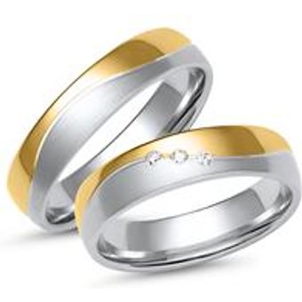 Eheringe aus Weiß- und Gelbgold mit 3 Diamanten