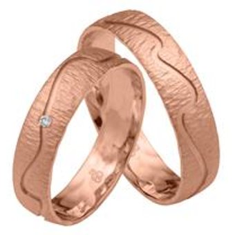 Trauringe aus Roségold mit Diamant