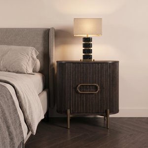 View Luxor brushed brass ribbed 1 door curved bedside cabinet