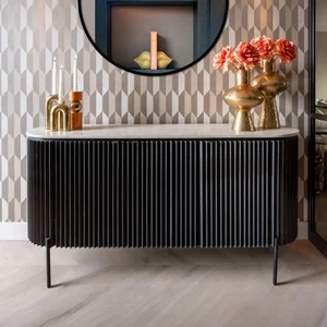 View Hampton 3 door black fluted large sideboard with travertine beige top