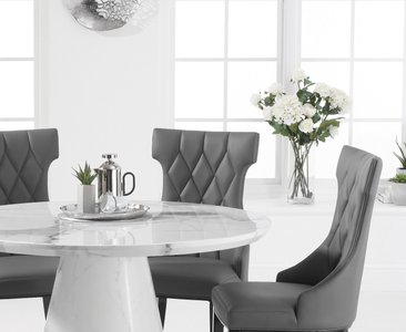 View Ravello 130cm round white marble dining table with 6 grey sophia chairs View Ravello 130cm round white marble dining table with 6 grey sophia chairs
