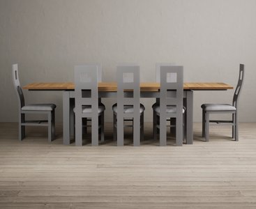 View Extending buxton 180cm oak and light grey dining table with 8 light grey painted chairs View Extending buxton 180cm oak and light grey dining table with 8 light grey painted chairs