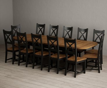 View Extending olympia 180cm oak and black painted dining table with 12 rustic oak painted chairs View Extending olympia 180cm oak and black painted dining table with 12 rustic oak painted chairs