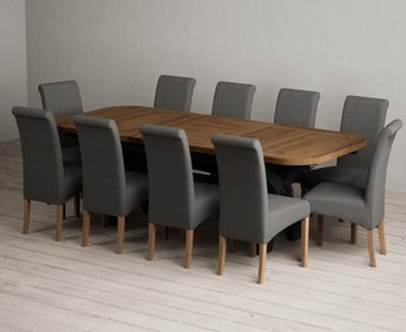 View Extending olympia 180cm oak and dark blue dining table with 10 charcoal grey scroll back chairs View Extending olympia 180cm oak and dark blue dining table with 10 charcoal grey scroll back chairs