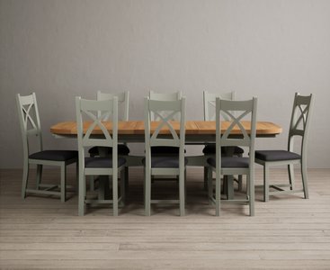 View Extending olympia 180cm oak and soft green dining table with 8 charcoal grey painted chairs View Extending olympia 180cm oak and soft green dining table with 8 charcoal grey painted chairs