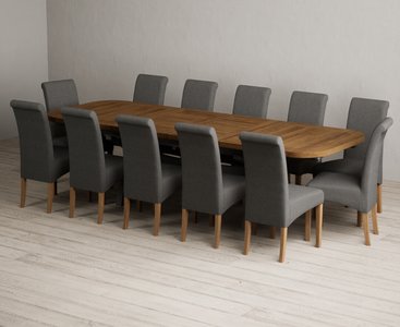 View Extending olympia 180cm oak and charcoal grey dining table with 12 charcoal grey scroll back chairs View Extending olympia 180cm oak and charcoal grey dining table with 12 charcoal grey scroll back chairs
