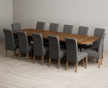 View Extending olympia 180cm oak and dark blue dining table with 12 charcoal grey scroll back chairs View Extending olympia 180cm oak and dark blue dining table with 12 charcoal grey scroll back chairs