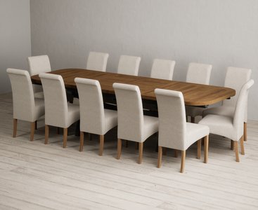 View Extending olympia 180cm oak and dark blue dining table with 12 natural scroll back chairs View Extending olympia 180cm oak and dark blue dining table with 12 natural scroll back chairs