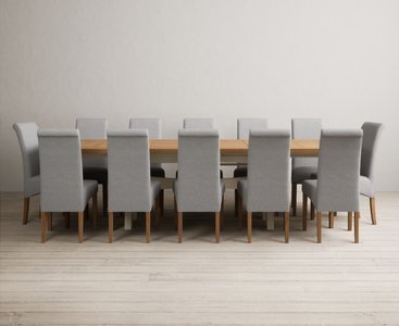 View Extending olympia 180cm oak and cream painted dining table with 12 grey scroll back chairs View Extending olympia 180cm oak and cream painted dining table with 12 grey scroll back chairs