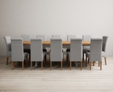 View Extending olympia 180cm oak and soft white painted dining table with 12 grey scroll back chairs View Extending olympia 180cm oak and soft white painted dining table with 12 grey scroll back chairs