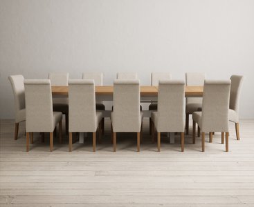 View Extending olympia 180cm oak and soft white painted dining table with 12 natural scroll back chairs View Extending olympia 180cm oak and soft white painted dining table with 12 natural scroll back chairs