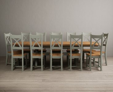 View Extending olympia 180cm oak and soft green dining table with 12 oak painted chairs View Extending olympia 180cm oak and soft green dining table with 12 oak painted chairs
