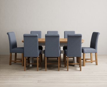 Photo of extending olympia 180cm oak and soft white painted dining table with 8 blue braced chairs