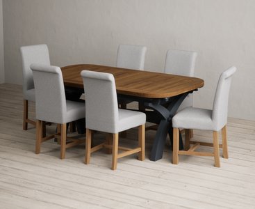 View Extending olympia 180cm oak and dark blue dining table with 6 grey braced chairs View Extending olympia 180cm oak and dark blue dining table with 6 grey braced chairs