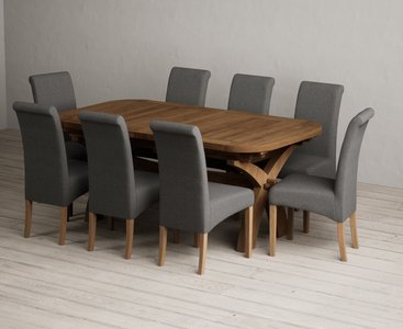 View Extending olympia 180cm rustic solid oak dining table with 8 charcoal grey scroll back chairs View Extending olympia 180cm rustic solid oak dining table with 8 charcoal grey scroll back chairs