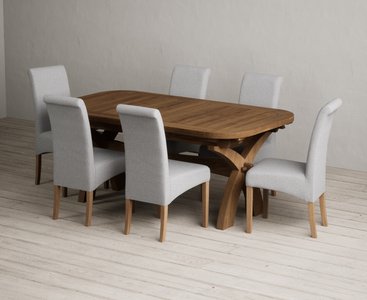 View Extending olympia 180cm rustic solid oak dining table with 6 grey scroll back chairs View Extending olympia 180cm rustic solid oak dining table with 6 grey scroll back chairs