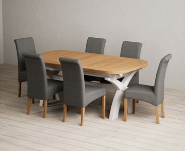 View Extending olympia 180cm oak and soft white painted dining table with 6 charcoal grey scroll back chairs View Extending olympia 180cm oak and soft white painted dining table with 6 charcoal grey scroll back chairs