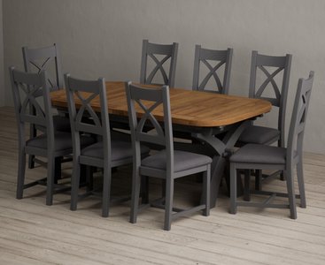 View Extending olympia 180cm oak and charcoal grey dining table with 8 charcoal grey painted chairs View Extending olympia 180cm oak and charcoal grey dining table with 8 charcoal grey painted chairs