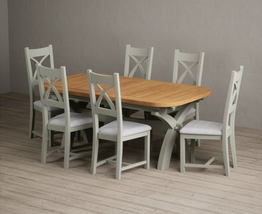 View Extending olympia 180cm oak and soft green painted dining table with 10 oak painted chairs View Extending olympia 180cm oak and soft green painted dining table with 10 oak painted chairs