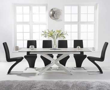 Photo of extending boston 180cm white leg ceramic dining table with 6 black aldo chairs